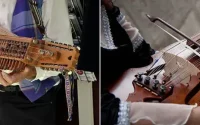 spelar nyckelharpa